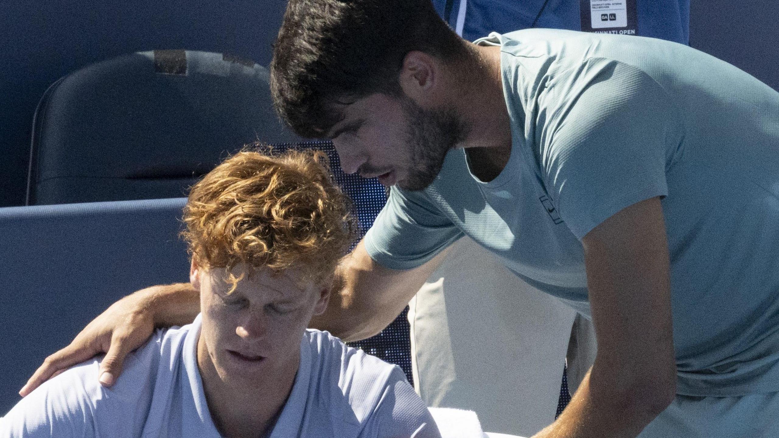 Alcaraz consoling Sinner
