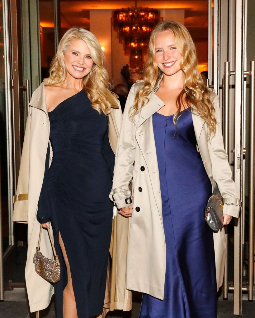 Christie Brinkley and Sailor Brinkley-Cook wearing navy trench coats