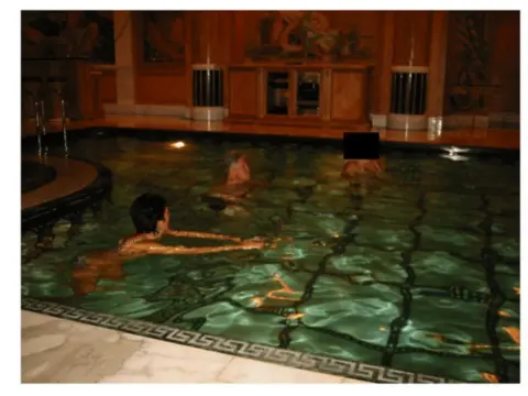 Bill Clinton in pool with Epstein