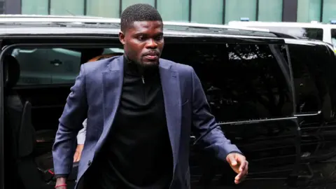 Thomas Partey denies rape and sexual assault charges at Southwark Crown Court