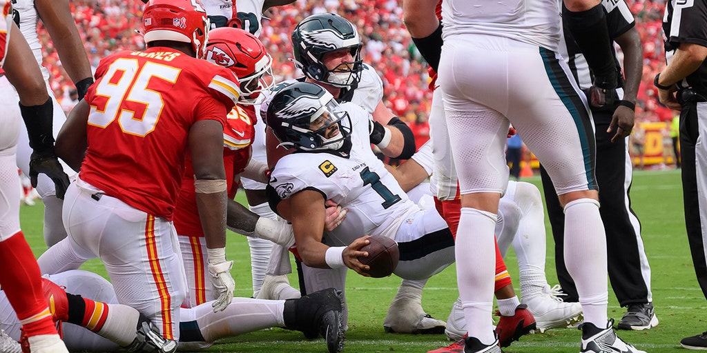 Hurts helped up by center Cam Jurgens