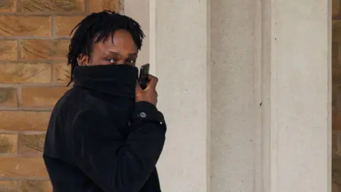 Police with recovered Banksy print