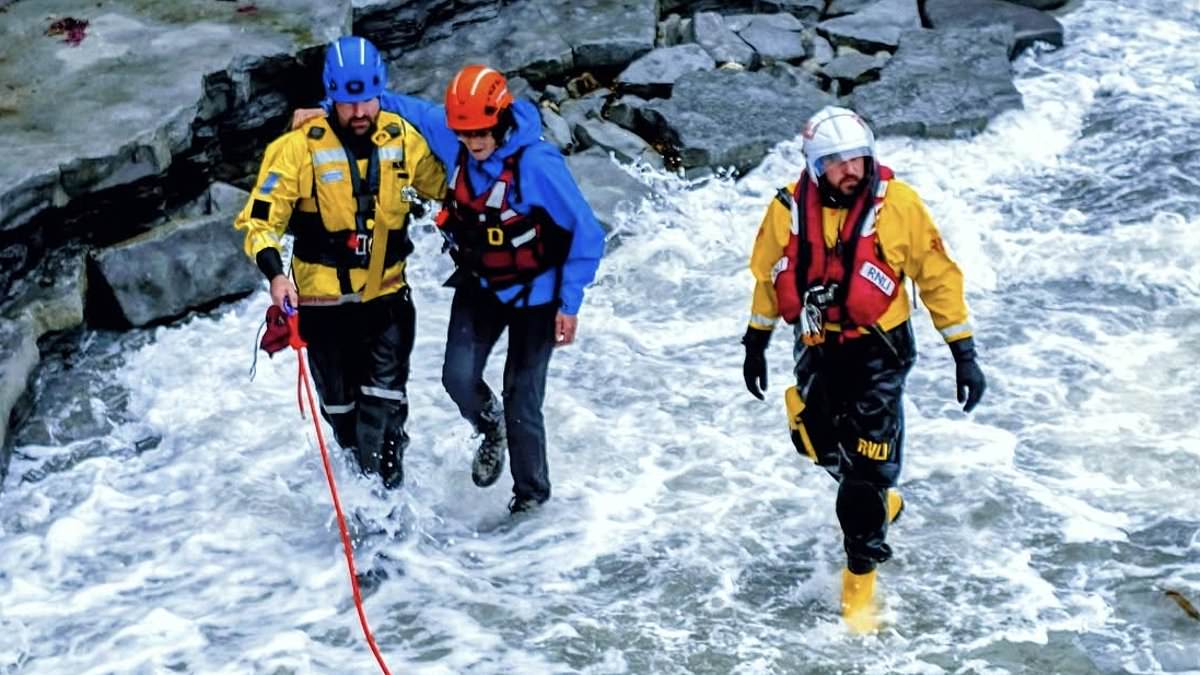 Four German holidaymakers rescued after being cut off by incoming tide at Lyme Regis