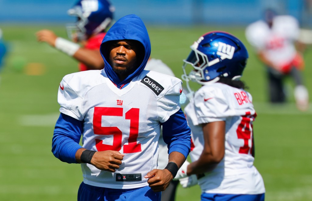 Abdul Carter looks on at Giants practice.
