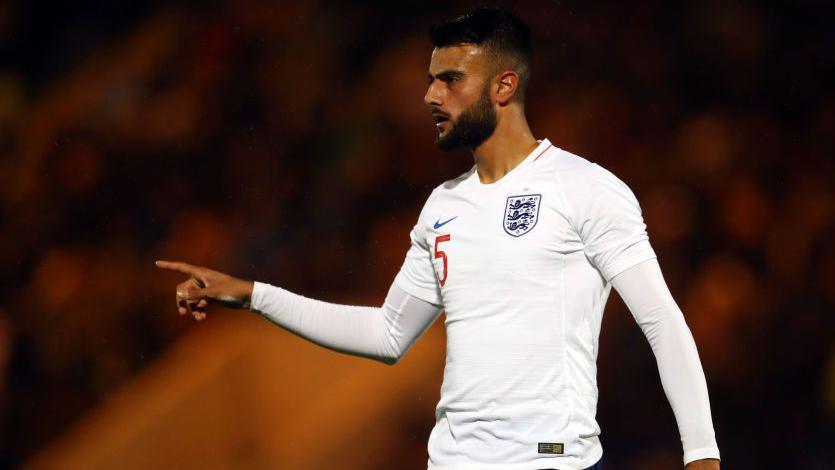 Spence on the pitch for Tottenham