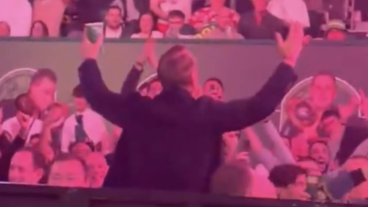 Ray Parlour downs pint after crowd mocks him at Ally Pally darts