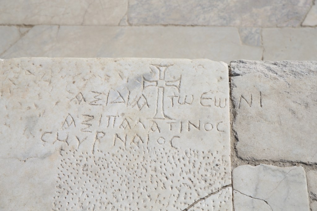 Stone carving showing cross and Chi‑Rho