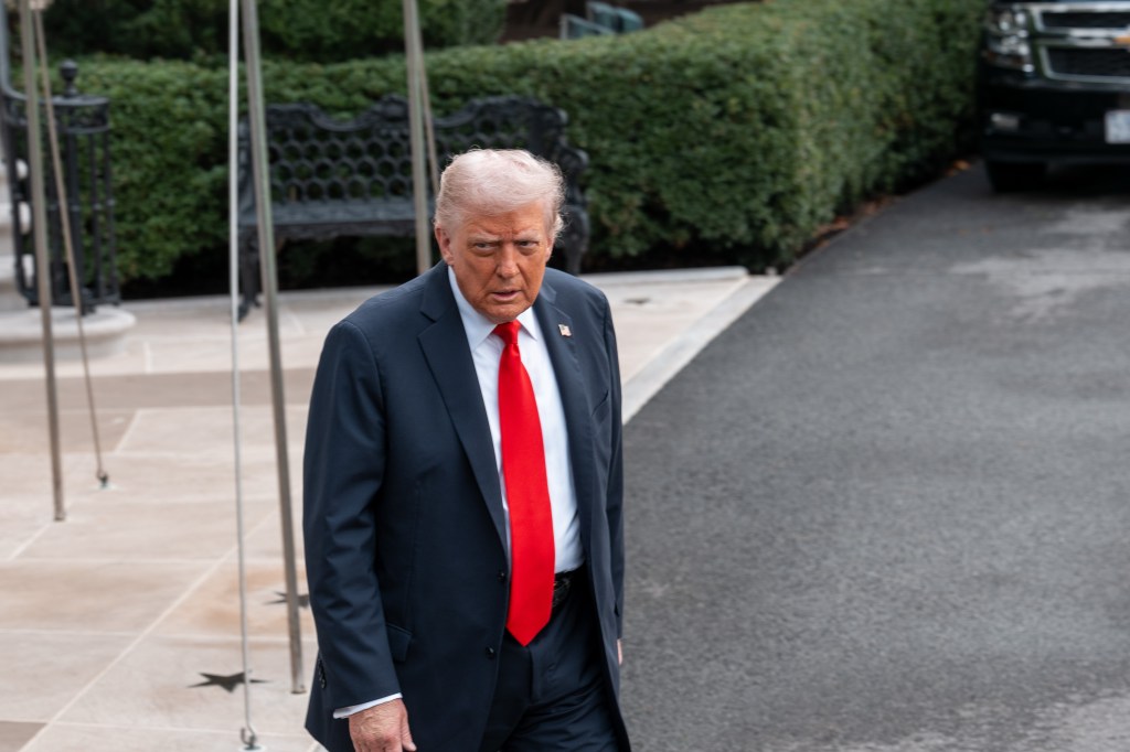 President Donald Trump speaks outside the White House